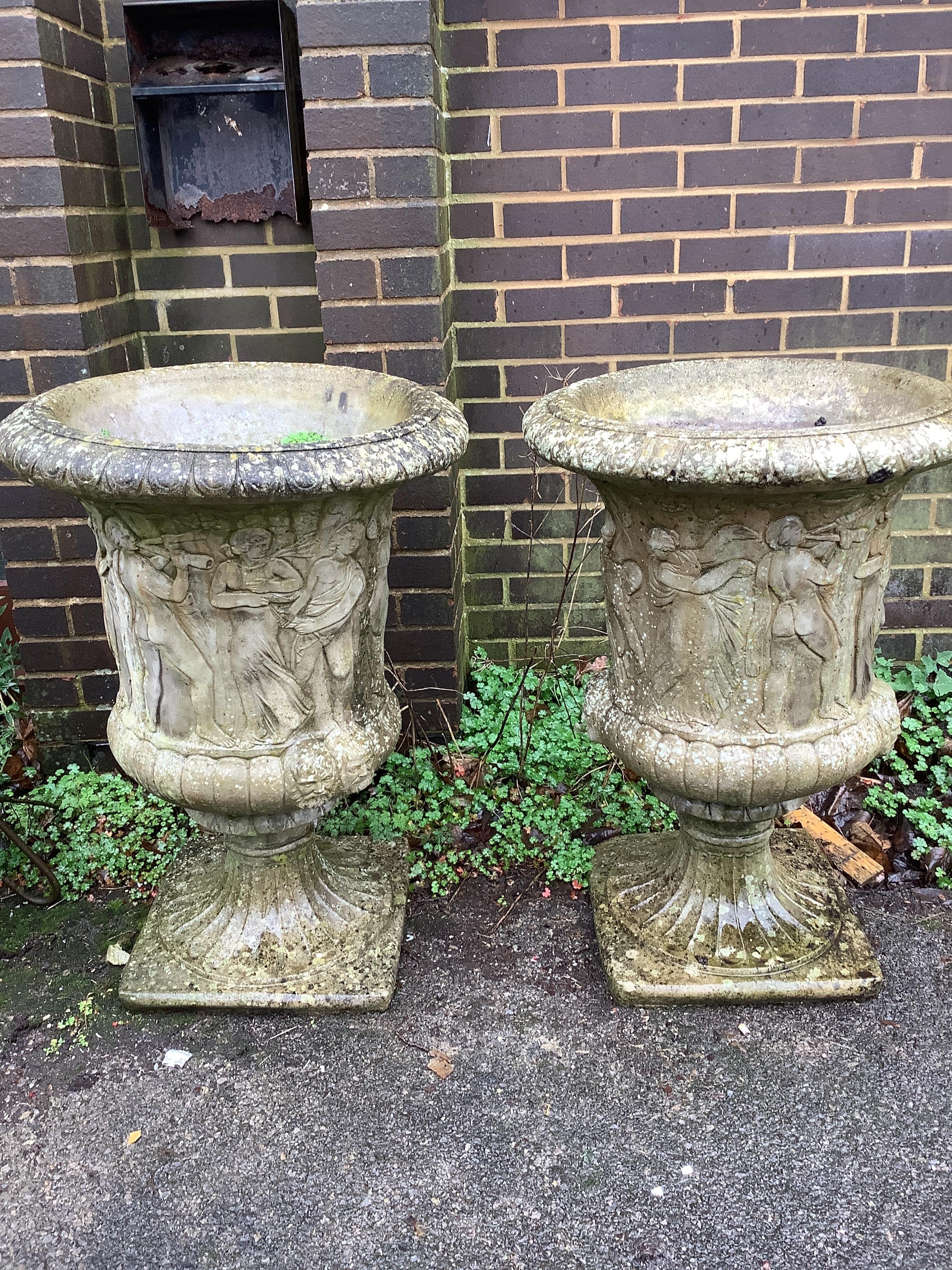 A pair of reconstituted stone campana garden urns, diameter 62cm, height 89cm